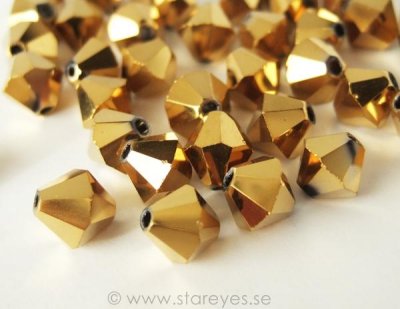 Bicone facetterade kristaller 8mm - Gold Metallic